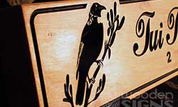 close up of carved tui to show quality